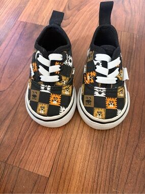 Vans baby Black, Orange & White Checkerboard Animal Slip-On Sneakers